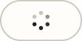 The pill while processing: a ring of grey dots.